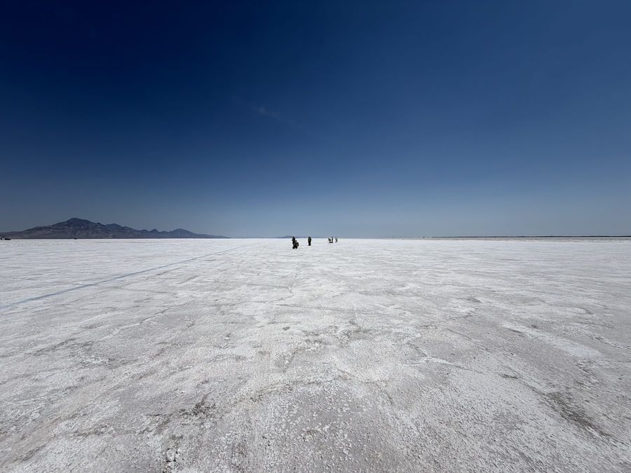 The white salt flats running out to the mountains