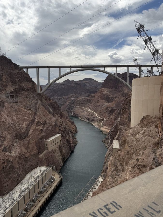 The Colorado River below the dam, with the bypass bridge beyond