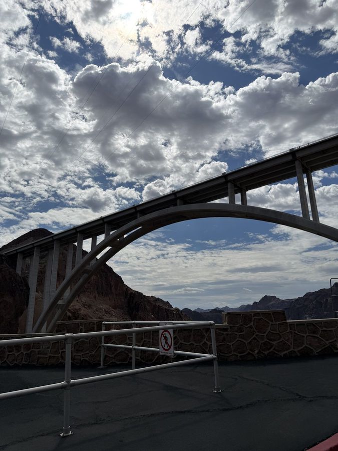 The arch of the bypass bridge under broken cloud