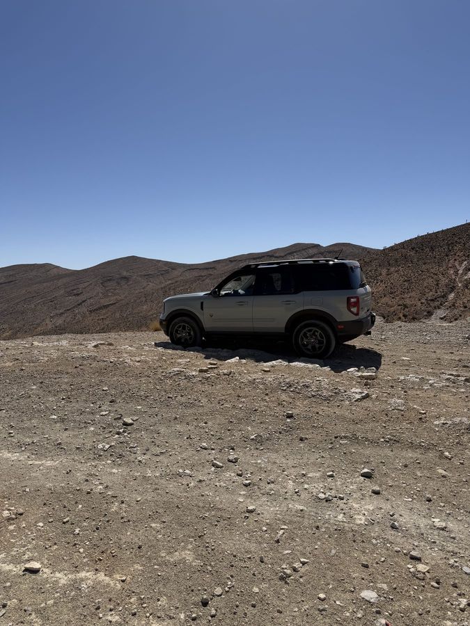 Daisy parked on a gravel pullout in the desert