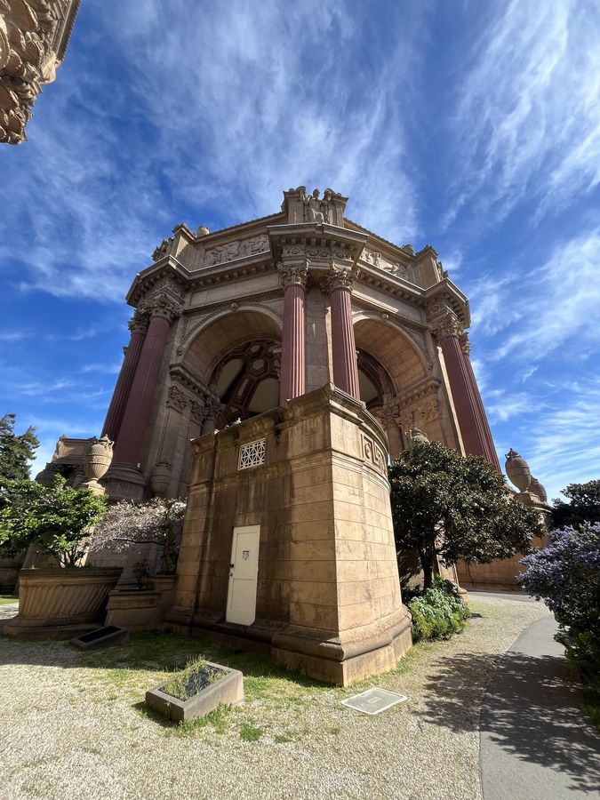 The rotunda of the Palace of Fine Arts under a streaked sky