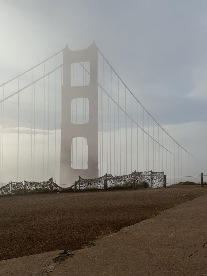 The Golden Gate tower in thick fog